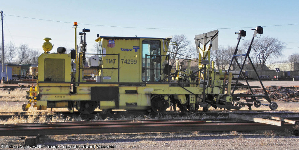 Small tamper in the south supply yard along 119th St.